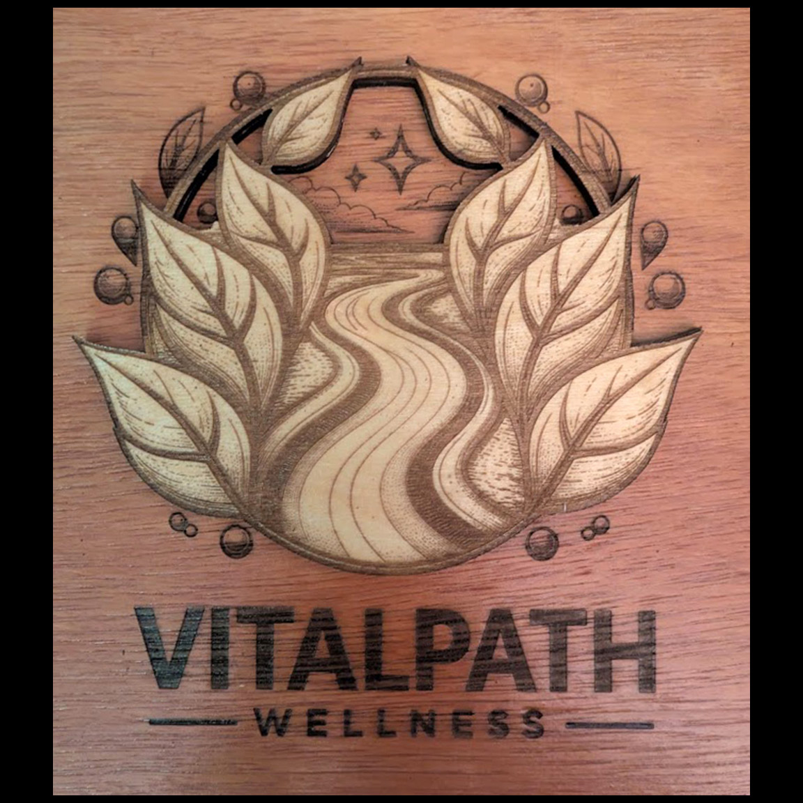 Business logo engraved in wood