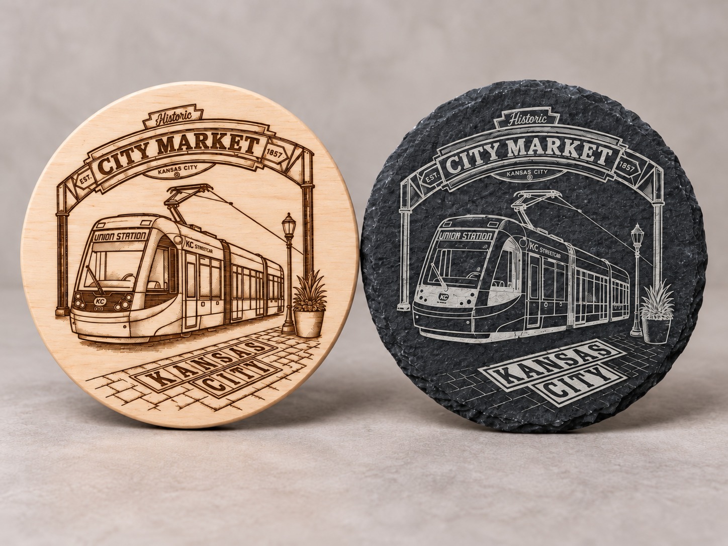 Kansas City streetcar coasters engraved in wood and slate side by side