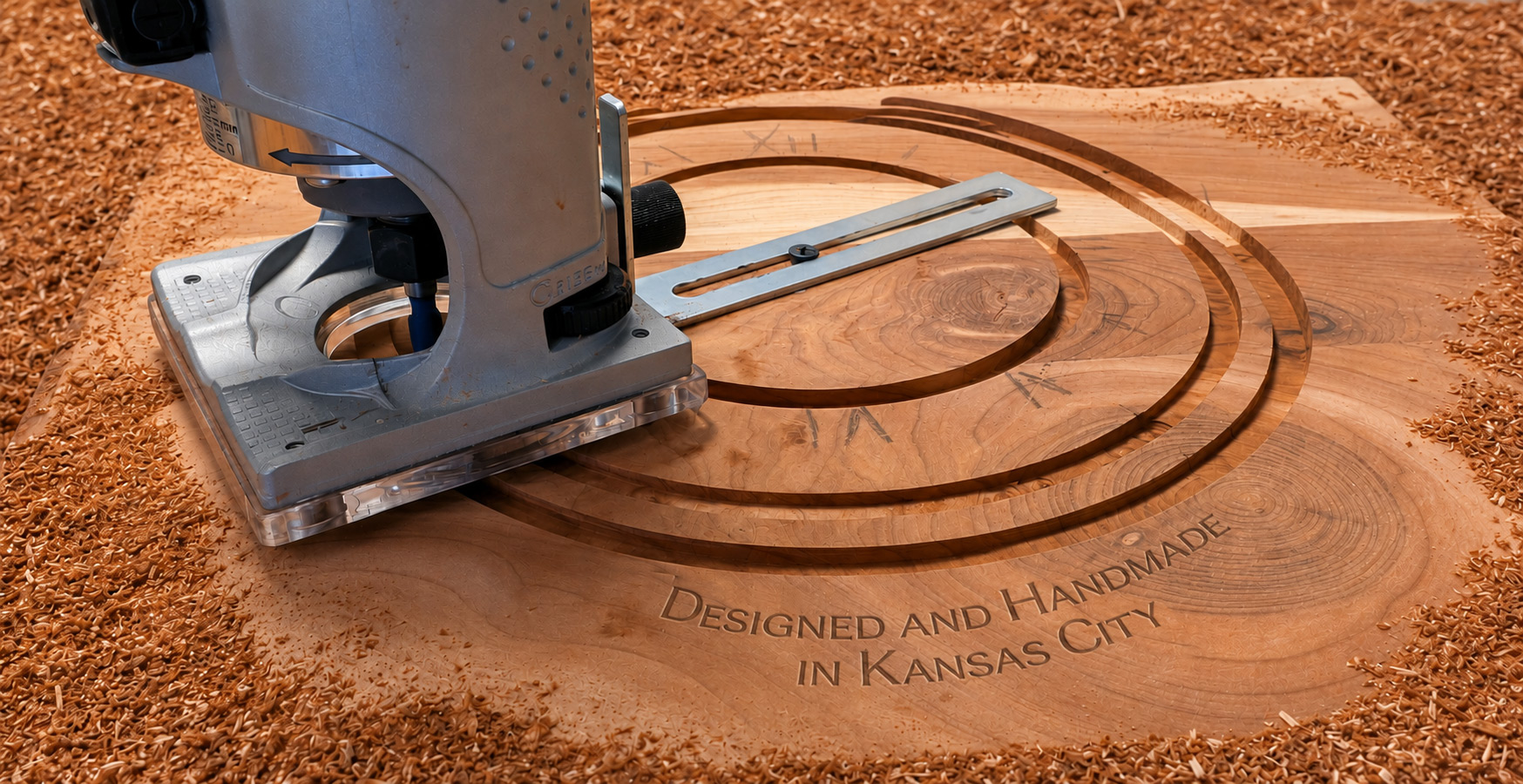 Router shaping a wooden clock designed and made in Kansas City